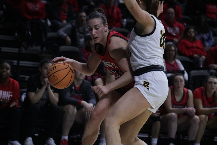 Central Missouri junior Reese Schaaf drives the ball against Fort Hays State on Thursday, March 6, at the Municipal Auditorium in Kansas City.