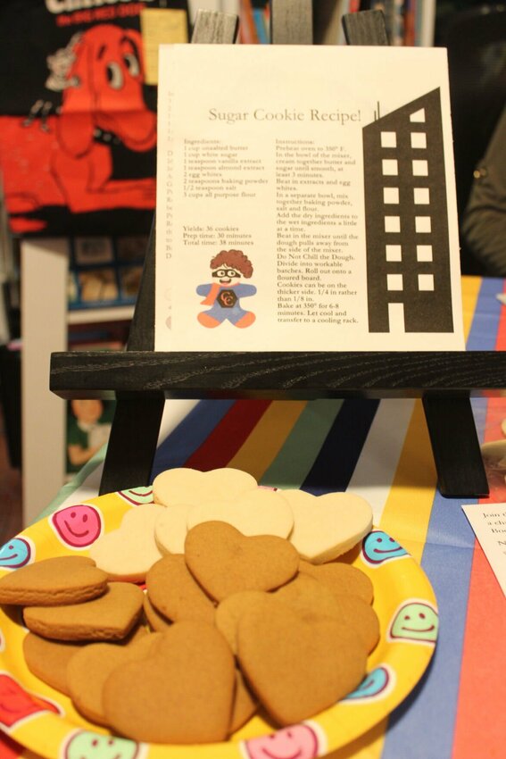 Heart shaped sugar cookies sit in front of a list of their recipe on Saturday, April 5, at the Gunzil &amp;amp; Bowser Children&rsquo;s Bookstore in Warrensburg. Readers can purchase the book which includes a sugar cookie recipe from Barker or on Amazon.&nbsp;