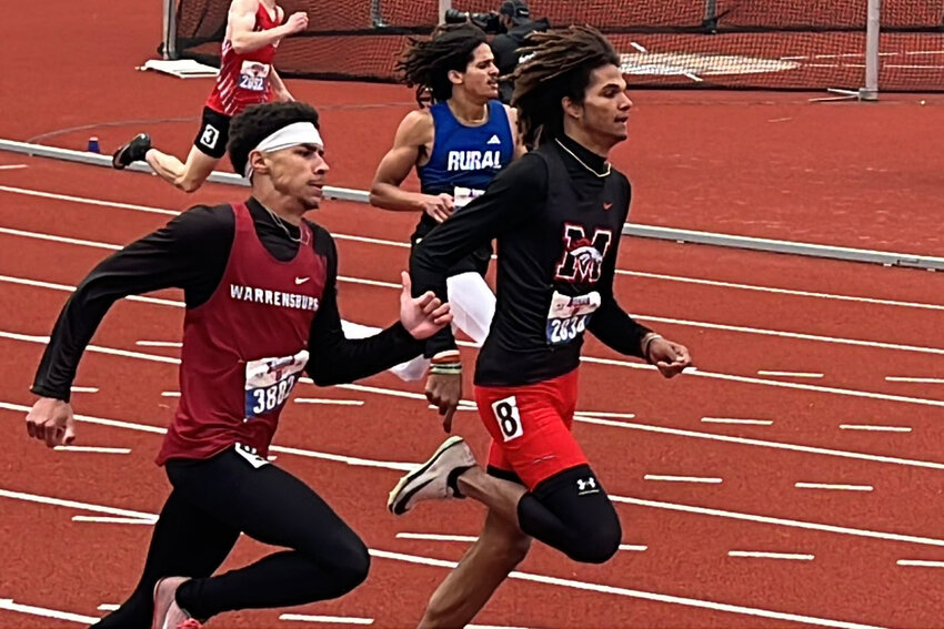 Warrensburg junior Cruz Villegas, junior Timarian Rozell, junior Seth Johnson and senior Ty Carman pose on the podium after finishing seventh in the Kansas Relays on Saturday, April 19, at Rock Chalk Park in Lawrence, Kansas.