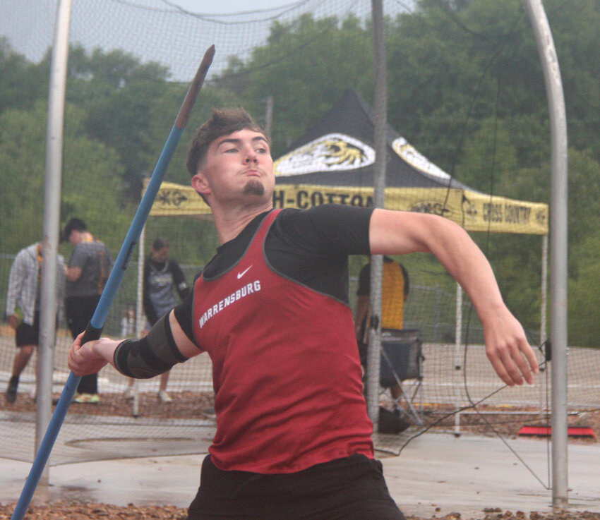 Warrensburg senior Ryan Munsterman throws javelin on Wednesday, May 7, at Smith-Cotton High School. Munsterman finished second.