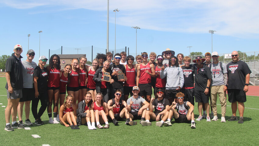 Both Warrensburg track and field programs clinched Class 4 District 7 team plaques Saturday, May 17, at the Warrensburg Activities Complex. The boys finished first, while the girls finished second.