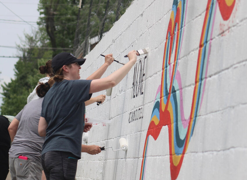 The Revival Washington Mural wall currently features one mural painted by Madeline Curtis. A second is planned by artist Brandi Miller.