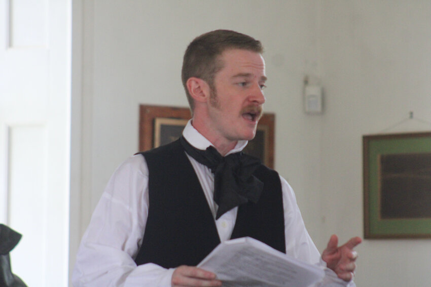 The Bailiff, portrayed by Frank Calhoun, addresses the courtroom during “The Trial of Old Drum,” on Saturday, June 14, at the Johnson County Courthouse.