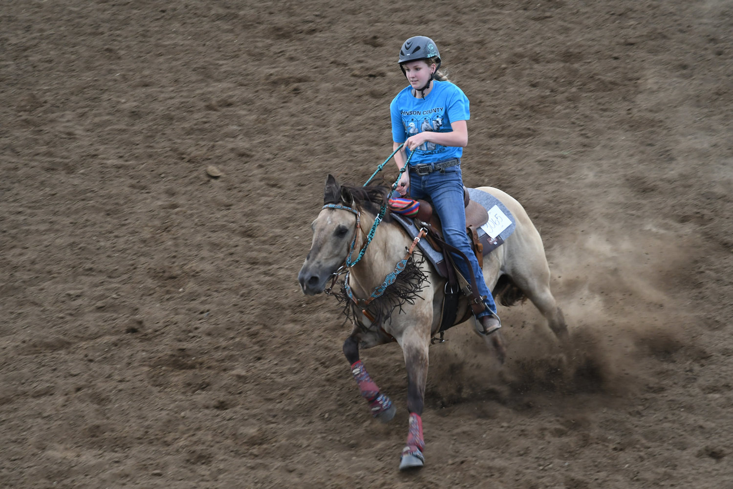 Cydney Larson of the Chilhowee Indians 4-H Club hits the brakes as she finishes a run in Barrel Racing.