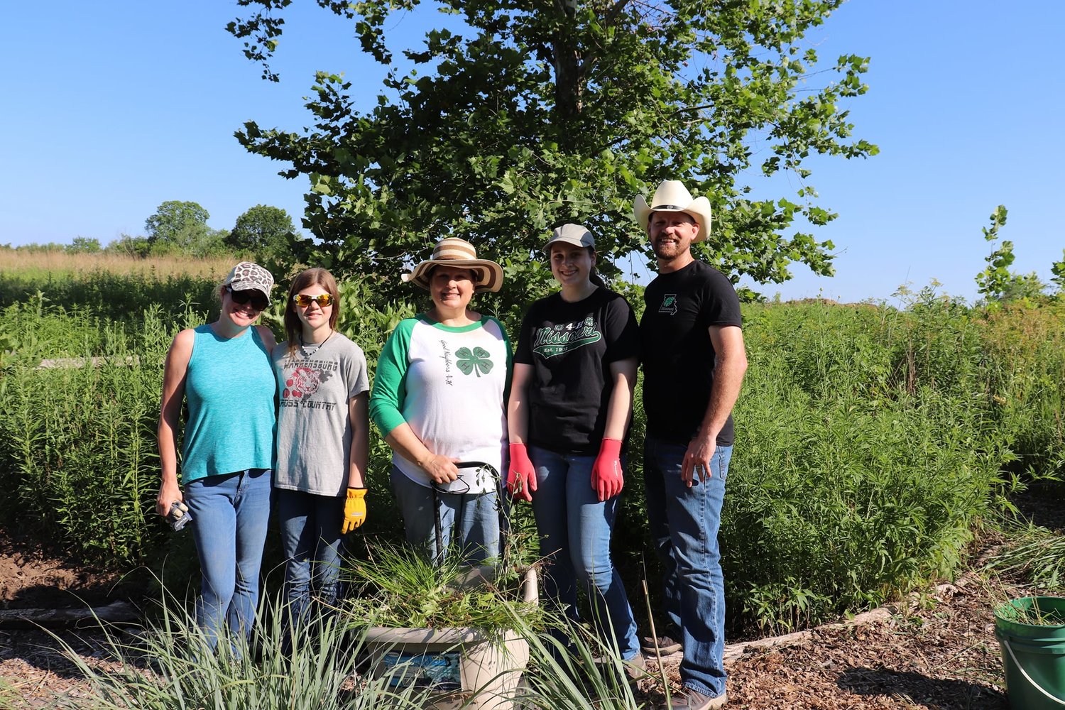Members of Johnson County 4-H pose for a photo at Turkey Foot Prairie. 