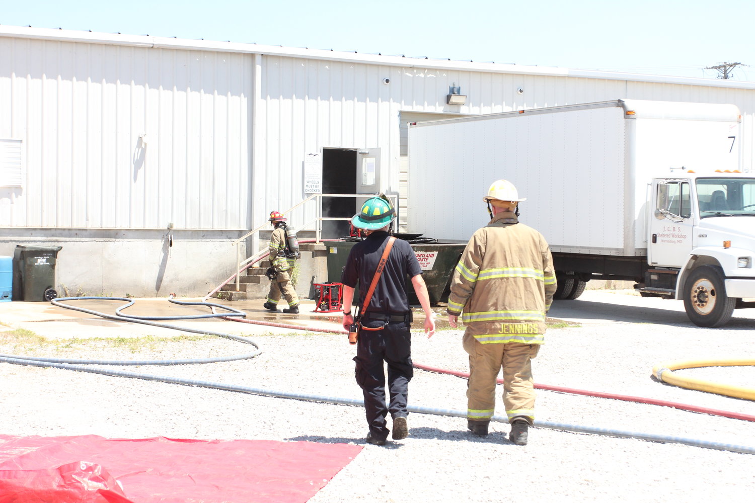 Firefighters work the scene of a fire Wednesday, June 29, at RISE Community Services.