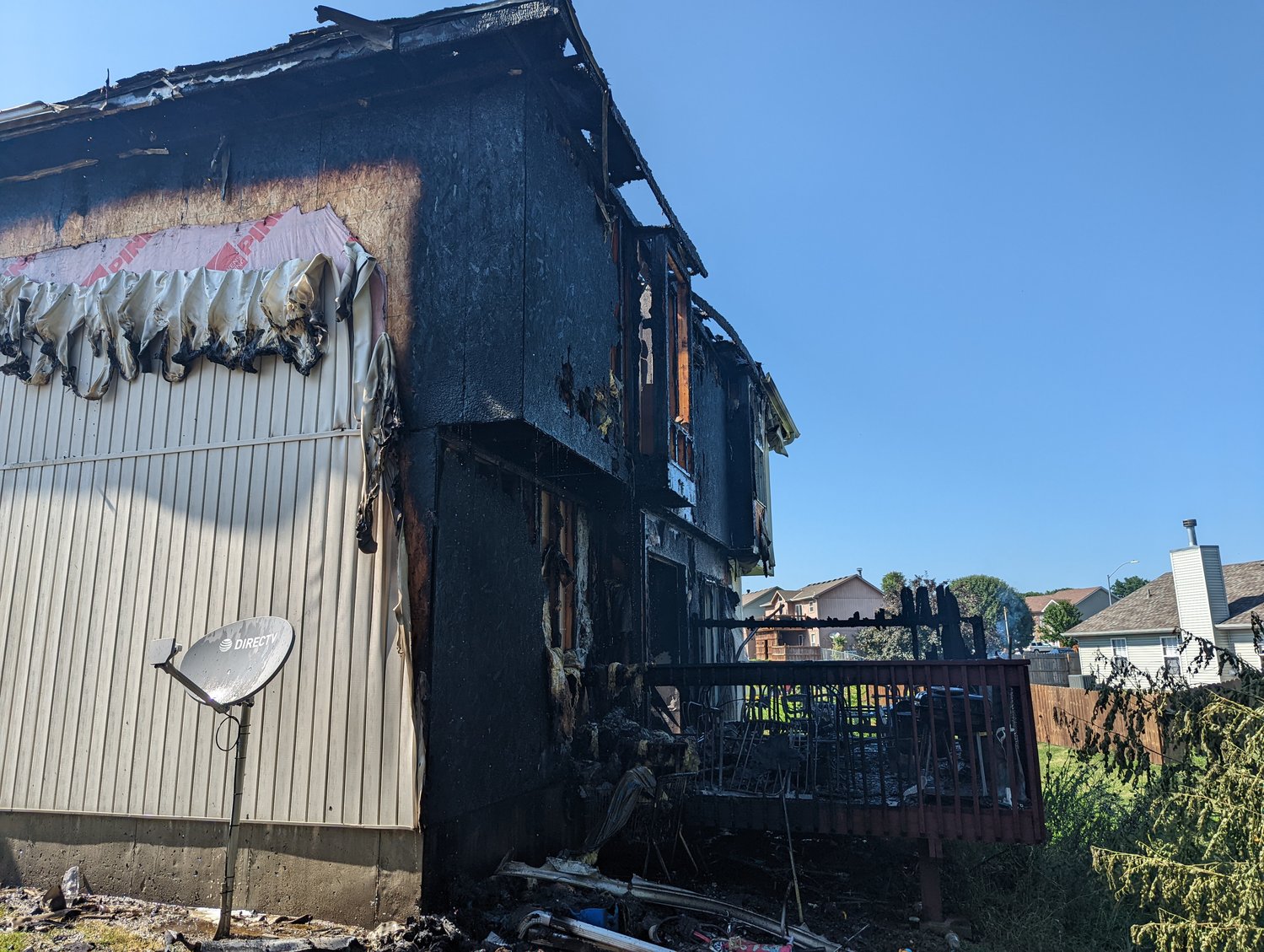 The back of a duplex is heavily damaged after a structure fire Sunday, July 10, in the 1200 block of Pebblecreek Drive.