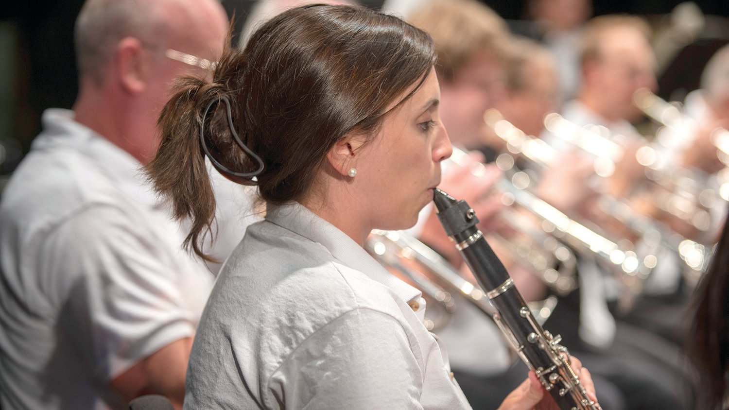 Sarah Ray, a Warrensburg High School faculty member, performs clarinet for the Warrensburg Community Band during the President’s Lawn Concert on Monday, July 25.