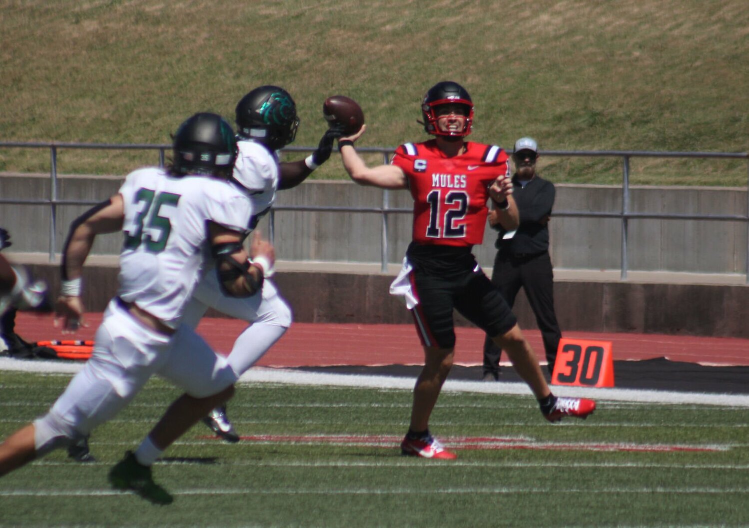 Central Missouri redshirt senior quarterback Zach Zebrowski throws a pass against Northeastern State on Saturday, Sept. 7, at Walton Stadium.