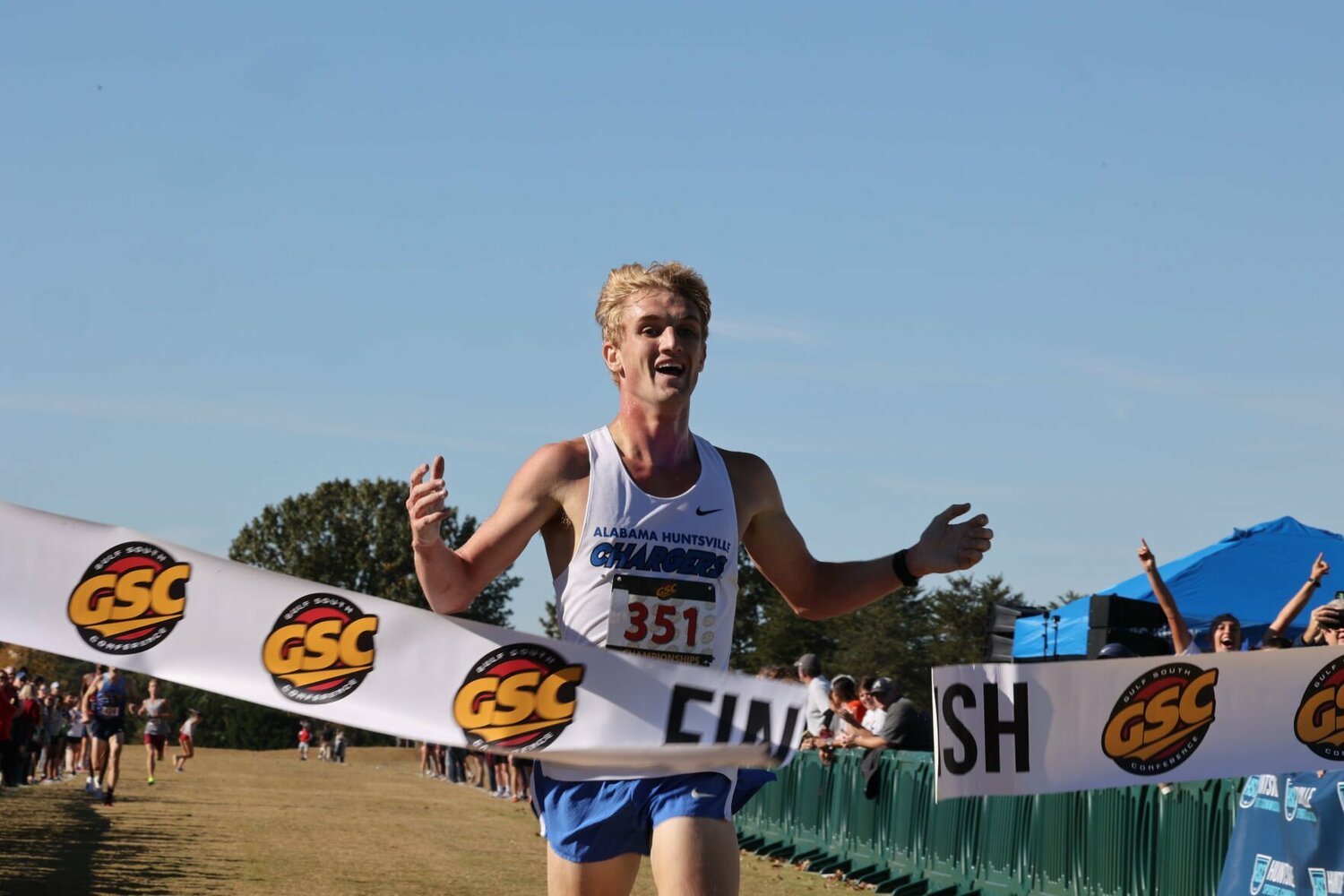 University of Alabama in Huntsville junior Sam Wilhelm crosses the finish line at the Gulf South Conference Cross Country Championships on Oct. 21, 2023, at John Hunt Park in Huntsville, Alabama.  
