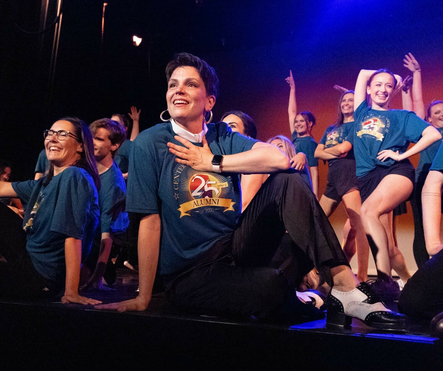 After tapping with the Center Stage alumni, studio owner Jennifer Renfrow celebrates a successful recital.