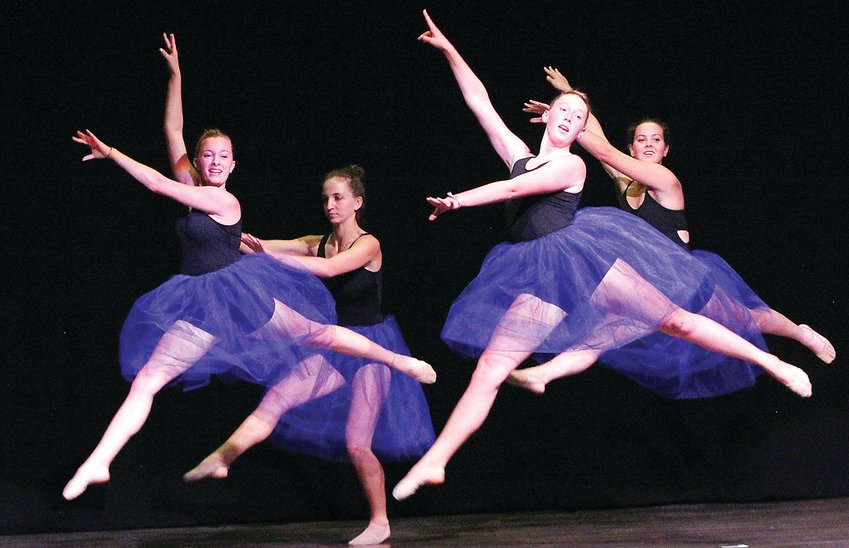Dancers Gracie Pointer, Brooke Pasmick, Phoebe Helms and Cora Olson shine during their recent performance at Ely's Historic State Theater.