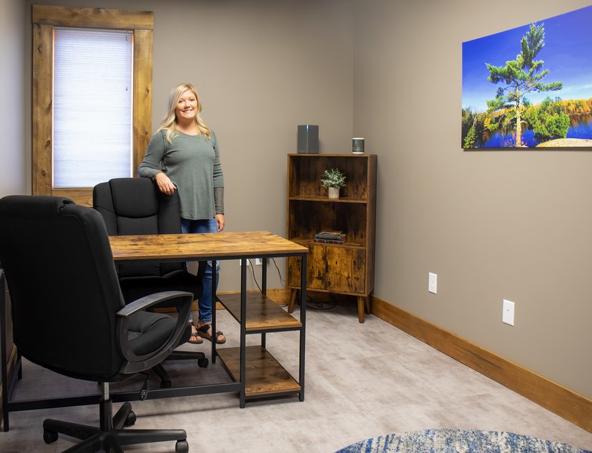 Tiffany McCormick stands in one of seven private offices available for rental at North Office in Cook.