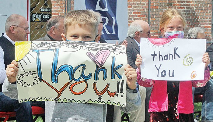 Washington Elementary students carried hand- made signs in a &ldquo;thank you&rdquo; parade last week at the school district&rsquo;s facility renovation groundbreaking ceremony.