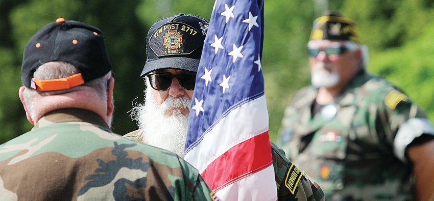 Ely Honor Guard commander Mike Pope and other veterans took part in the Memorial Day Service at the Ely Cemetery.