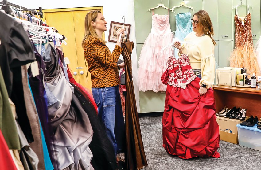 Ely teachers Amy Kingsley and Tracy Anderson organize the Ely High School Promwear Pop-up store in Room 13 at Memorial School. Outfits will be available all next week. Prom is set for Saturday, April 30.