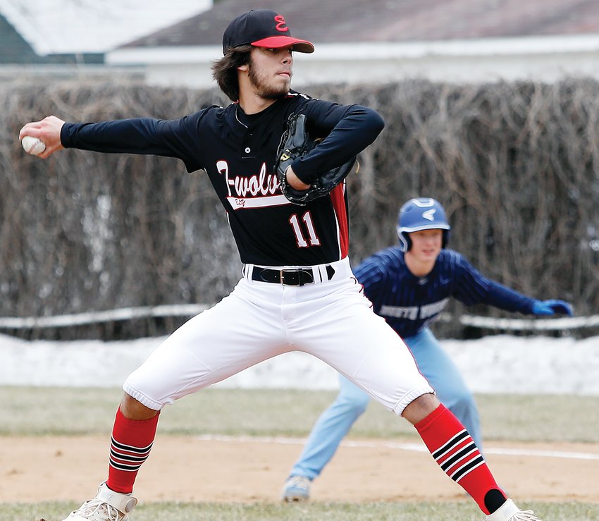 Ely senior pitcher Mason Davis winds during last Friday&rsquo;s game with North Woods.