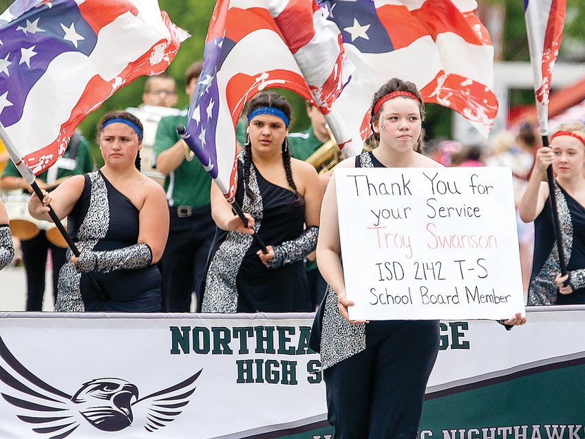 Members of the   Northeast Range marching band honored Troy Swanson during the Tower parade.   Swanson, who died June 30, was the longtime school board representative for the   Tower-Soudan area.