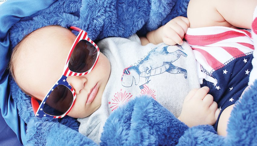 Troy Zupancich, at just seven weeks old, mostly napped through the Tower Fourth of July parade on Monday