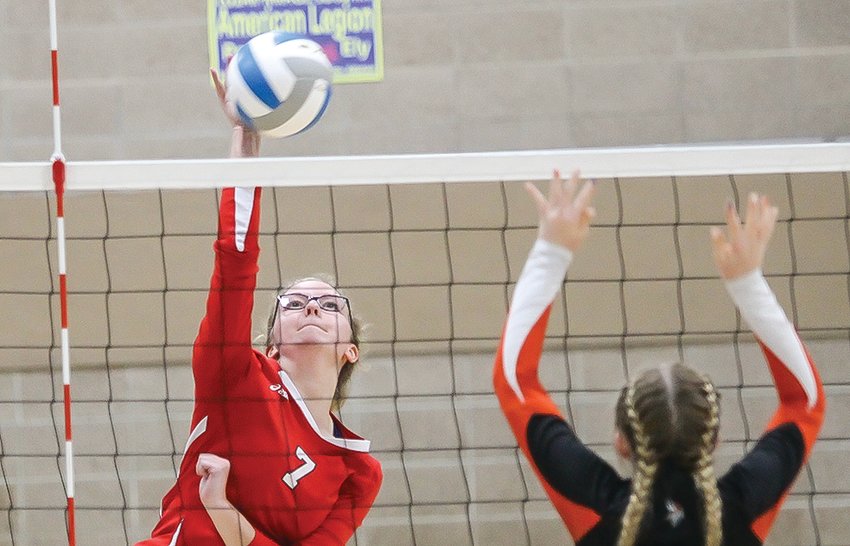 Senior Audrey Thomas goes up high for a kill during Tuesday&rsquo;s contest with Littlefork-Big Falls.