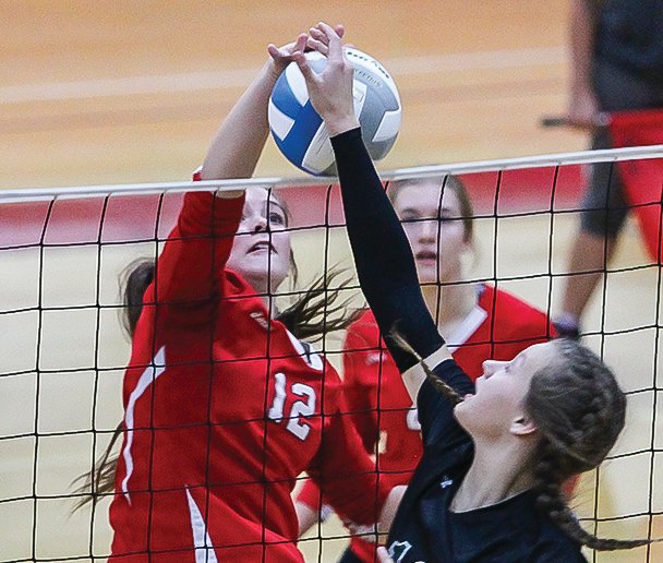 Ely&rsquo;s Lilli Rechichi goes up high for a kill during Monday&rsquo;s contest with Northeast Range.