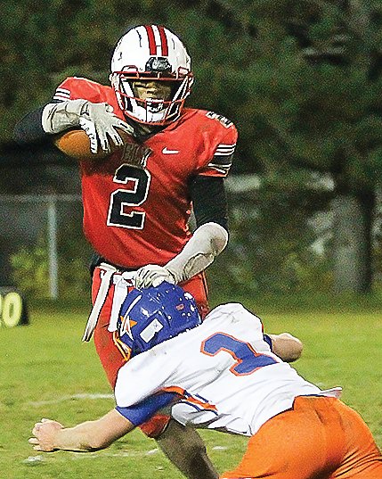 Ely senior   runningback Jason Kerntz seeks to avoid a   North Central defender during last Friday&rsquo;s homecoming match-up.
