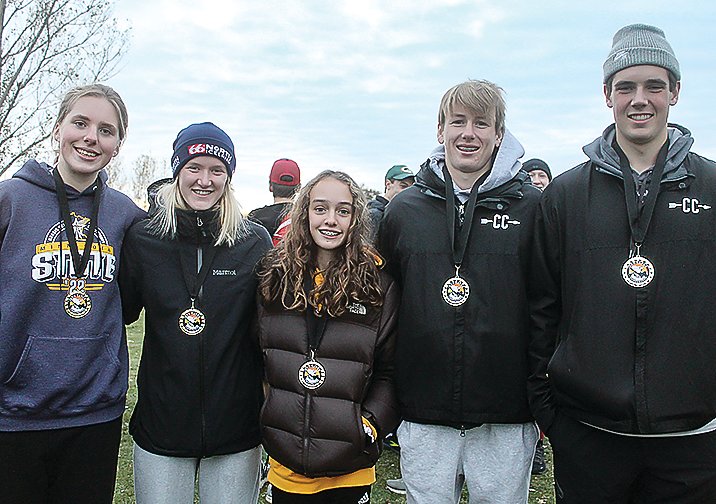 Ely runners named IRC All Conference, included (from left) Claire Blauch, Zoe Devine, Molly Brophy, Caid Chittum and Ben Cavalier on Oct. 19.