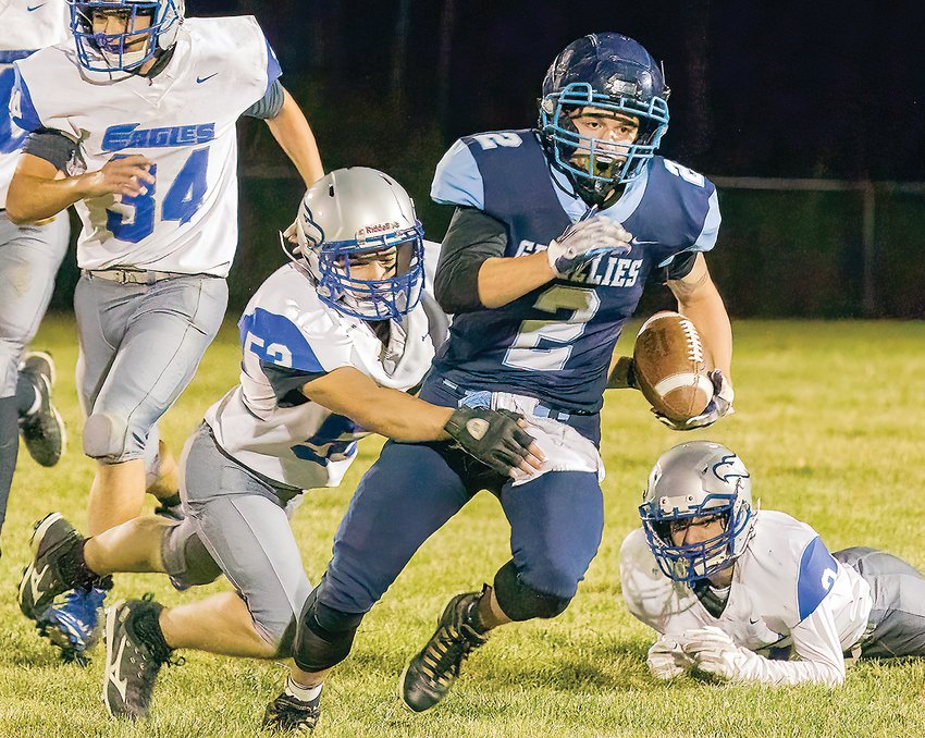 Jared Chiabotti bursts through a line of East Central defenders during last   Wednesday&rsquo;s regular season finale. Chiabotti rushed for 143 yards on 25 carries.