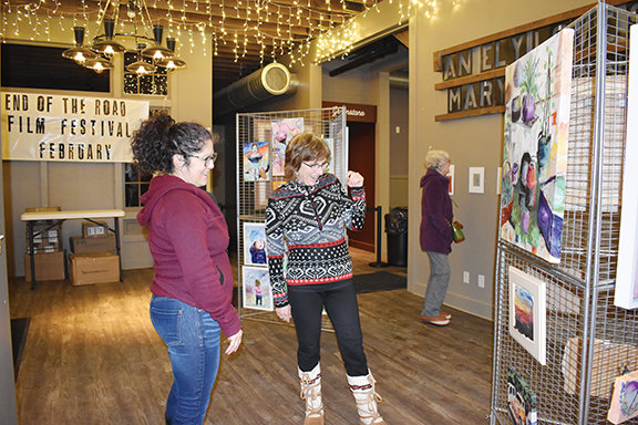 Dafne Caruso (left) and Sara Skelton (right) at the Northern Lakes Arts Association reception at the State Theater in Ely.