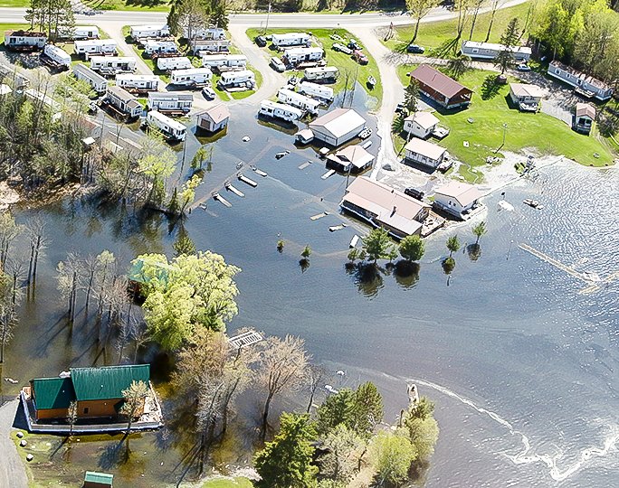 Widespread flooding, like this at Pine Aire Resort on Lake Kabetogama, affected hundreds of lake properties in the border country last year.  Will this year see a repeat? Only time will tell.