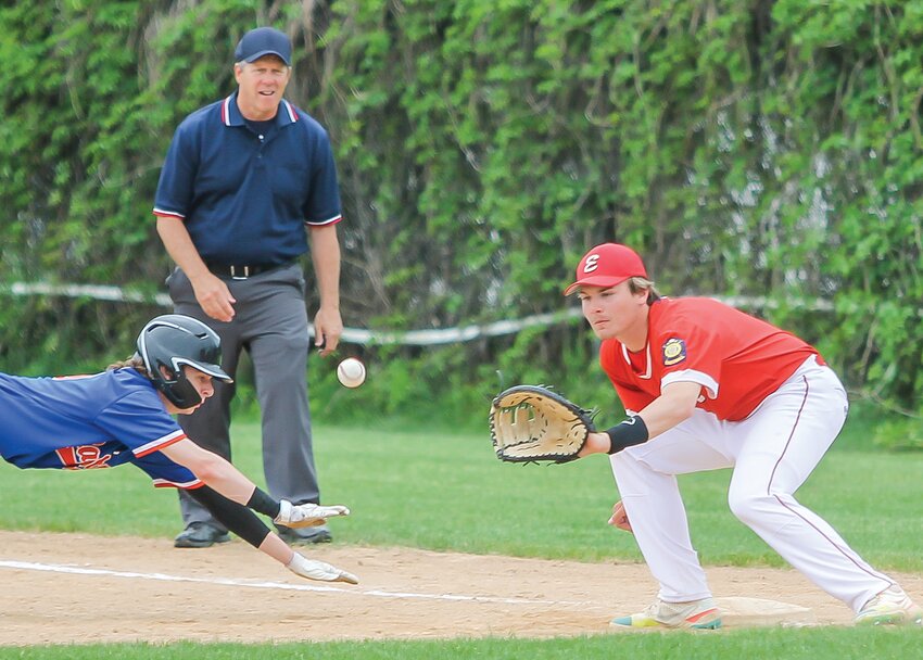 Ely first baseman Erron Anderson waits for the throw on a first base pick-off of a Carlton runner on Tuesday.