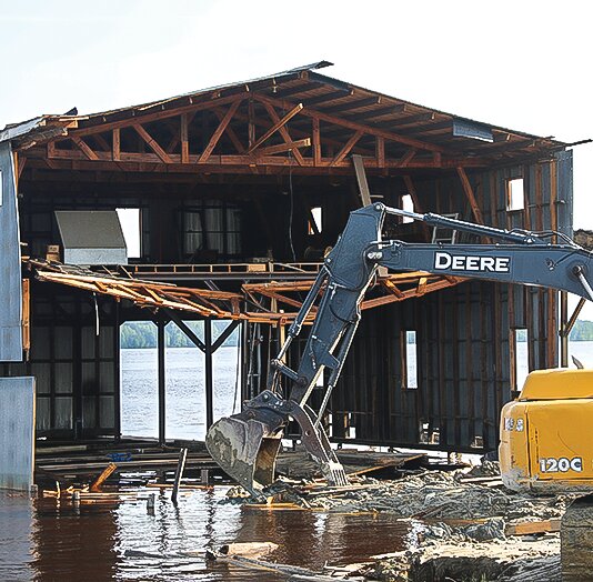 The two-story   boathouse at Aronson Boat Works is no more. The 80-year-old building came down this week to make room for new docking.