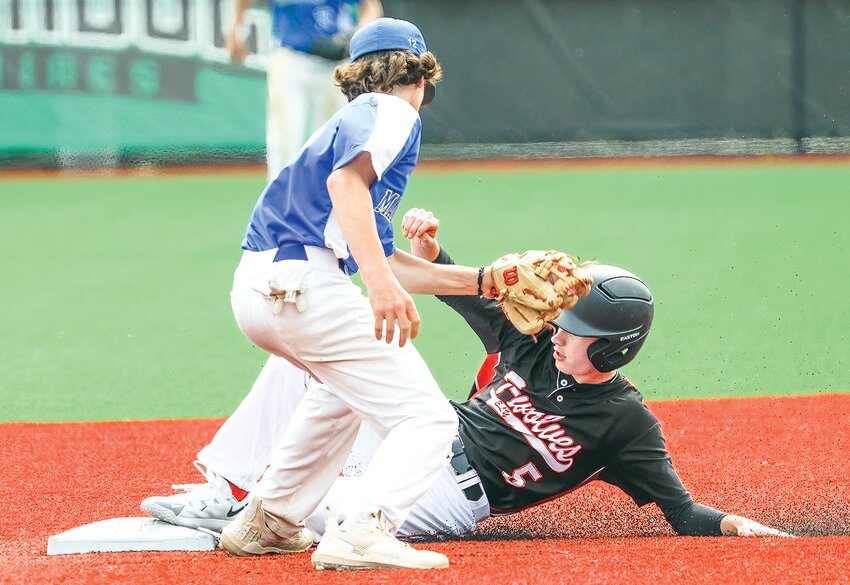 Ely freshman standout Jack Davies slides safely into second with a stolen base.