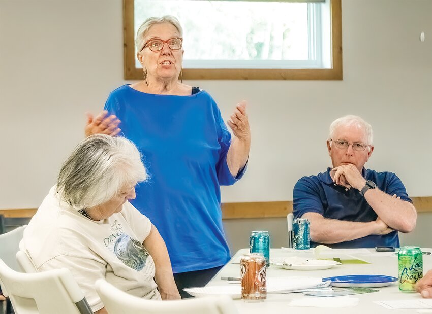 Leah Rogne reports on a small group discussion during the climate change event.