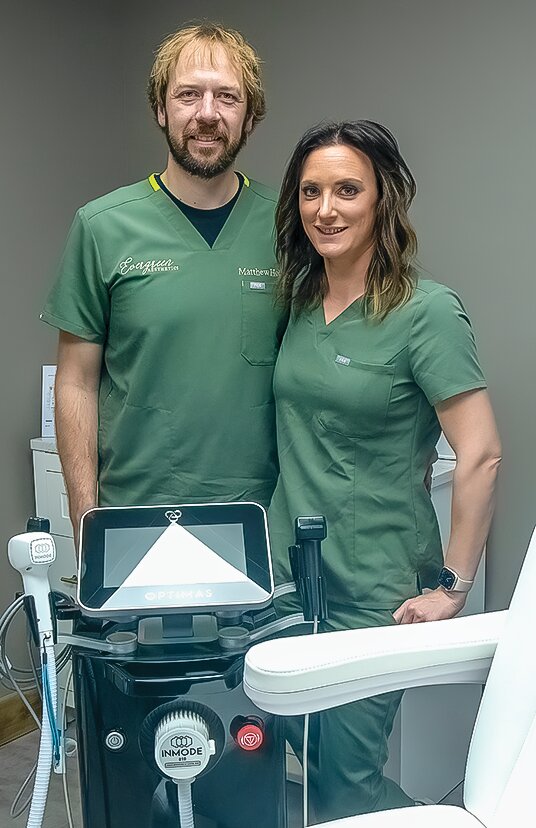 Matthew Holmes and   Kristen Scott in a treatment room at their new medical spa in Cook.   The couple will be hosting  a grand opening open house for their new business this Friday.