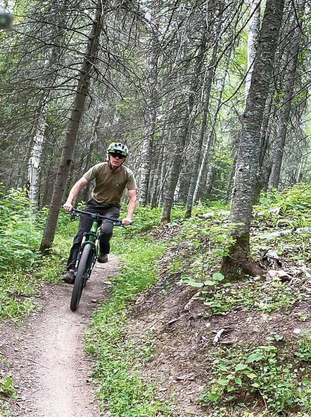 A rider winds his way along a narrow trail at   Hidden Valley.