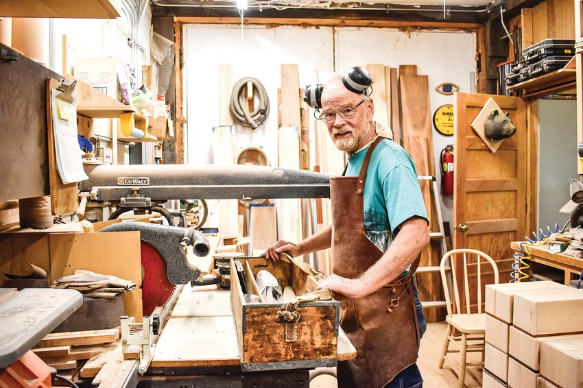 Ben Pawlak of Rusty Nail Woodcraft, shown here with his immigrant grandfather&rsquo;s chest of woodworking hand tools from Sweden.