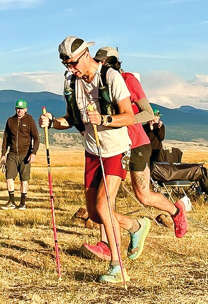 Orr native Jacob Skraba reaches an alpine meadow checkpoint in the grueling Leadville 100 run.