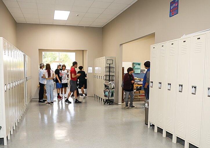 Students in the hallway of the newly-renovated school.