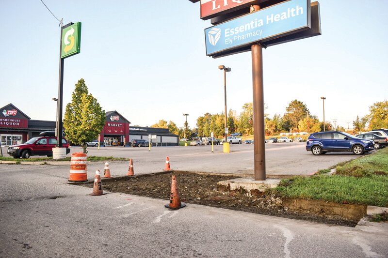 The demise of the curb and paving of Ely&rsquo;s worst right turn into the Zup&rsquo;s parking lot: the material constrcting the turn has been dug out and now will be paved over.