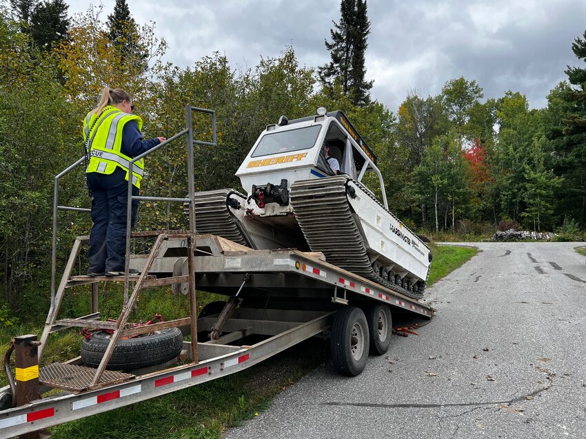 A Marsh Masater tracked vehicle used in the search for Glenn Stevenson last Sunday is loaded after another fruitless day of searching by St. Louis County Rescue Squuad members.