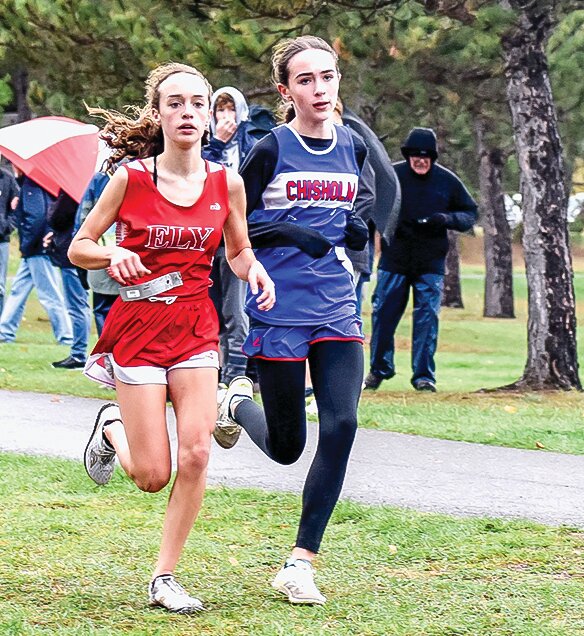 Ely&rsquo;s Molly Brophy and Chisholm&rsquo;s Olivia Pascuzzi were stride for stride about midway through their race last Thursday in Ely.  Brophy pulled away later in the race to claim first place.