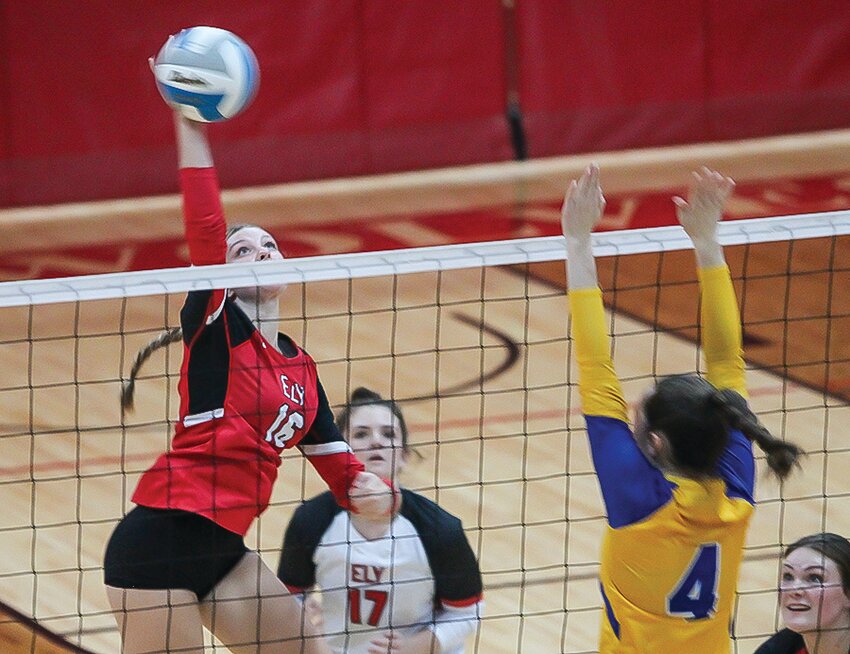 Ely   freshman  Charlotte Hegman goes up high for a kill during Tuesday&rsquo;s regular season   finale with   Bigfork. The Wolves remain unbeaten in section play.