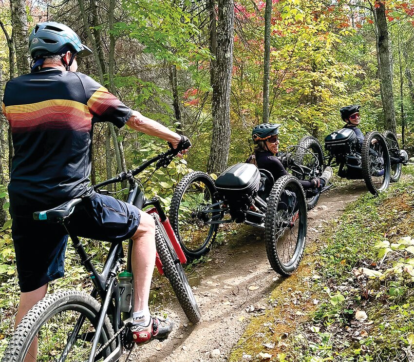 Two   disabled riders using adaptive mountain bikes were able to enjoy the new mountain bike trails at Hidden Valley this year. The trails have proven to be extremely popular, attracting thousands of visits in their first year.