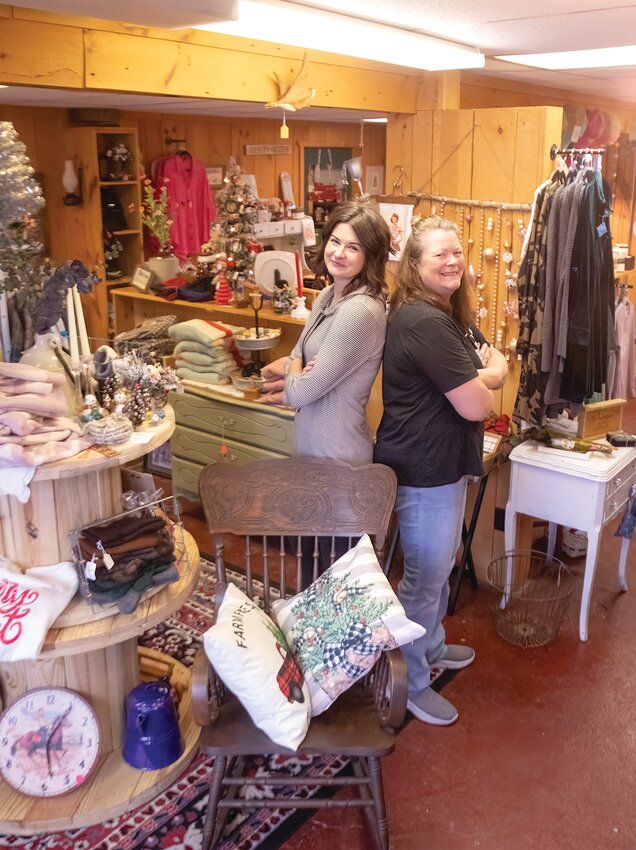 River Street Vendor Boutique owners Kaycee Danielson and Deanna Washek take a moment to pose in their new Cook shop last Saturday.