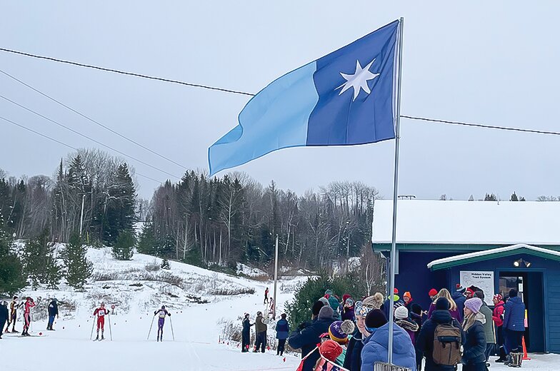 The new Minnesota state flag flew over Hidden Valley on Saturday during the Ely Invitational Nordic ski meet.