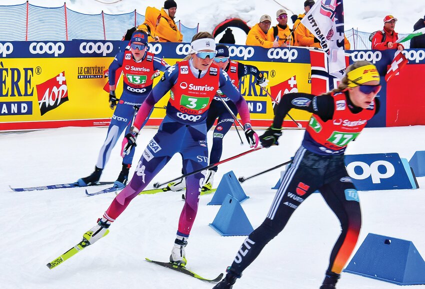 Erin Bianco (#3), originally of Ely, rounds a corner during World Cup competition last month in Goms, Switzerland.
