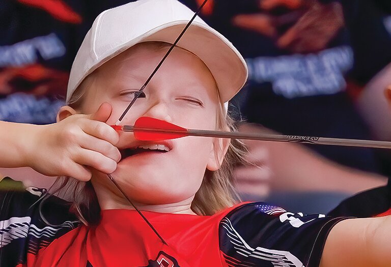 Ely archer Mason Lee takes aiming seriously during the recent competition.