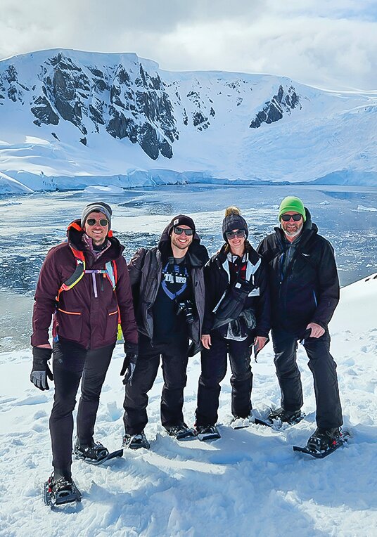 Steve Abrahamson, far right, with his daughter Nova, her husband John and a friend pose during their recent visit to   Antartica.