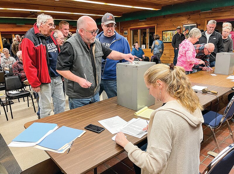 Greenwood residents voting at the Greenwood Township annual meeting.